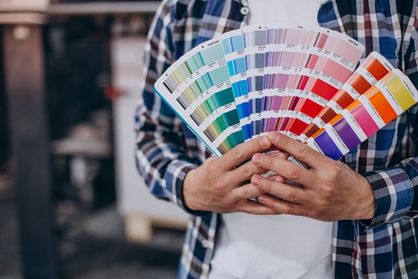  Man - Working - Printing - House - With - Paper - Paints - 2